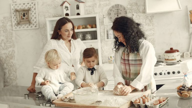 Three generations enjoying baking together in a cozy kitchen with natural light.